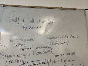 List of self & collective care resources written on a white board